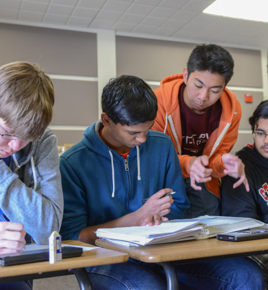 Students working together at the Davidson Academy