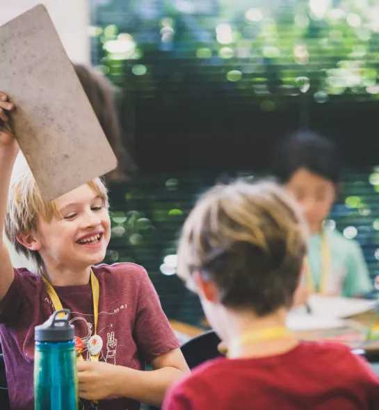 A photo of happy students in the classroom