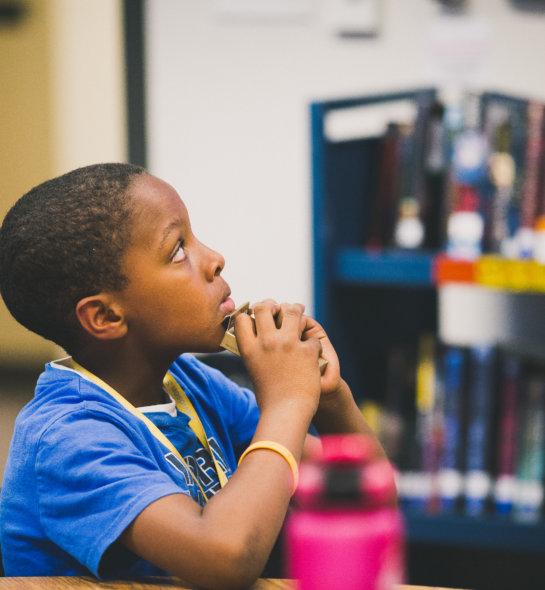 A student listening intently